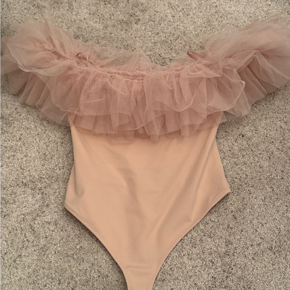 Elegant women’s One Piece with Ruffle Detail